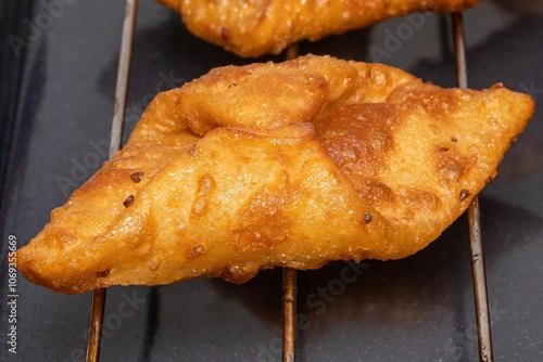 Fried sweets (pestiños) typical Spanish dessert from Andalusia and Extremadura. Ideal for Carnival and Easter. photo