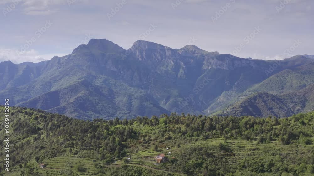 Mountains and Green Hills in Liguria: Aerial Drone View on a Bright Day with Blue Sky – Drone Flyover Dolly Out Mountains and Green Hills in Liguria: Aerial Drone View on a Bright Day with Blue Sky – Drone Flyover Dolly Out