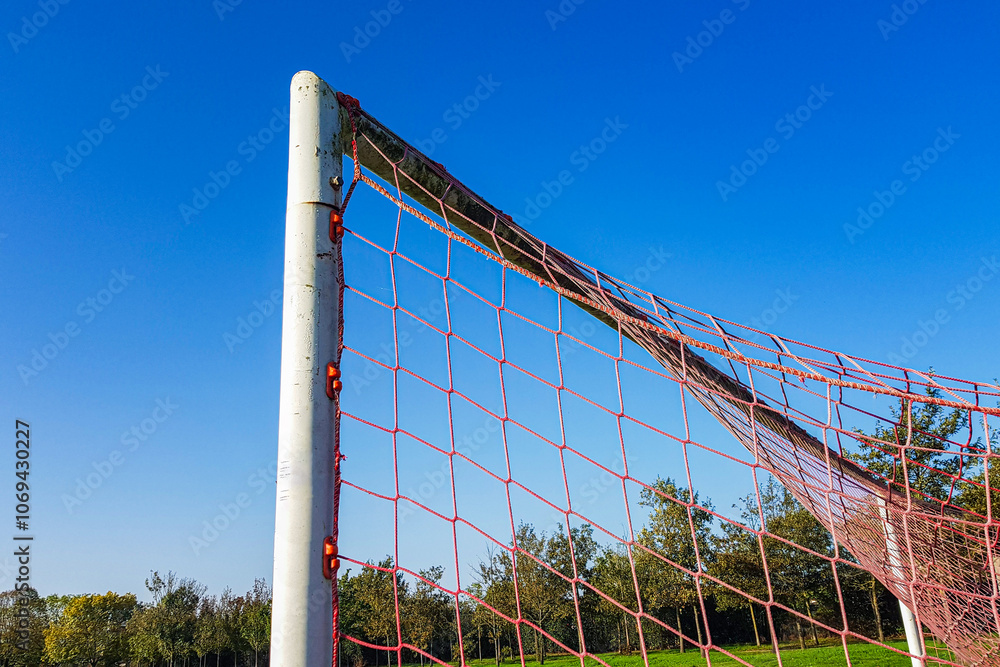 coccer net on blue sky background coccer net on blue sky background