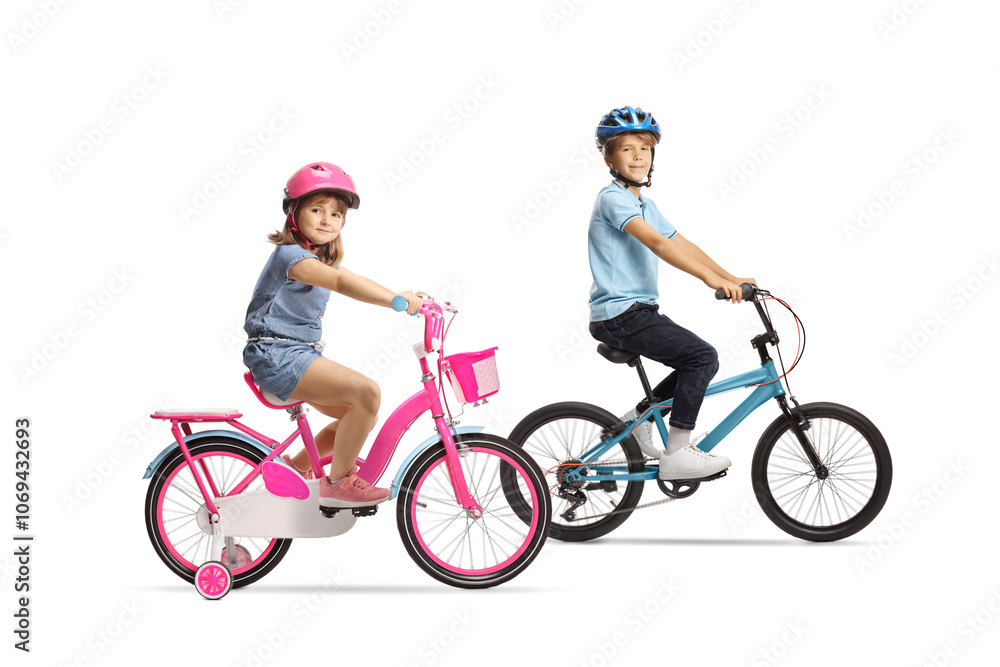 Obraz premium Children riding bicycles with helmets