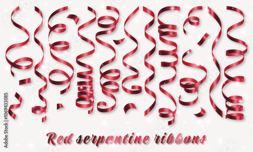 Red curly streamers. Red shiny serpantine ribbons. Confetti. New year decoration on light background.