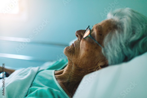 Elderly Woman Resting Peacefully in a Hospital Room