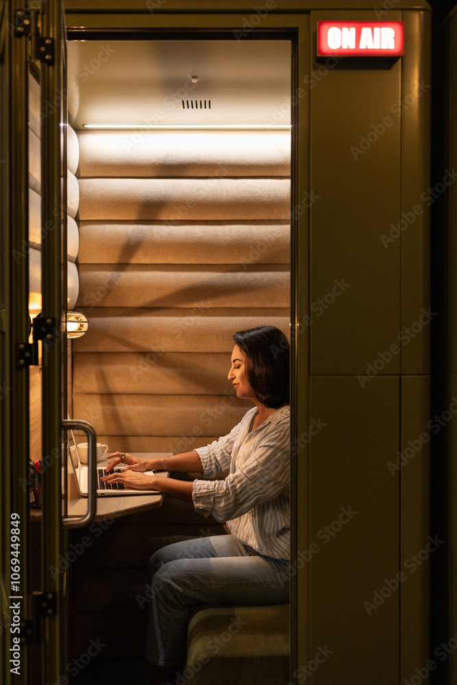 Focused Work in Modern Soundproof Booth at Coworking Space Focused Work in Modern Soundproof Booth at Coworking Space