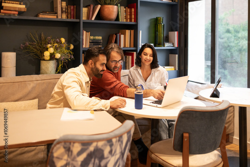 Collaborative Team Working in a Bright Coworking Space photo