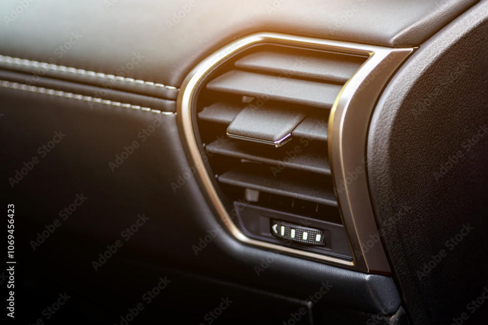 Inside the car.Car ventilation system and air conditioning. Modern car interior details.Detailing. Inside the car.Car ventilation system and air conditioning. Modern car interior details.Detailing.