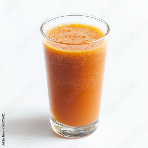 A glass of carrot juice, isolated on a white background, emphasizing a sweet and healthy drink