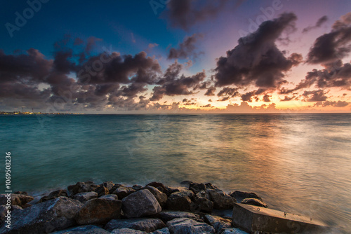 Colorful cloudy sundown scene in Sunset Beach, Chatan Okinawa, Japan photo