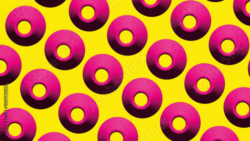 Vibrant magenta torus shapes on yellow backdrop photo