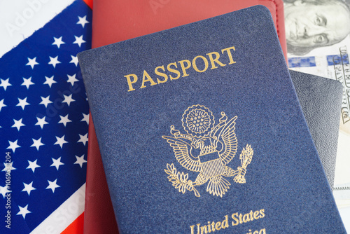 US passport issued to citizen and national of the United States of America to travel in most countries outside with USA flag and dollar money.