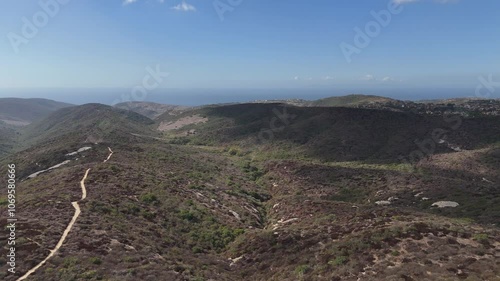 Pacific Ridge Hiking and Biking Trail leading to multiple canyon trails above Newport and Laguna Beach near Irvine in Orange County, Southern California.  photo