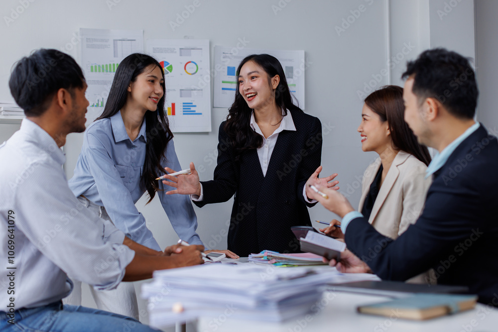 Asian business people working together in the office, Young asian people at business meeting.
Asian business people working together in the office, Young asian people at business meeting.