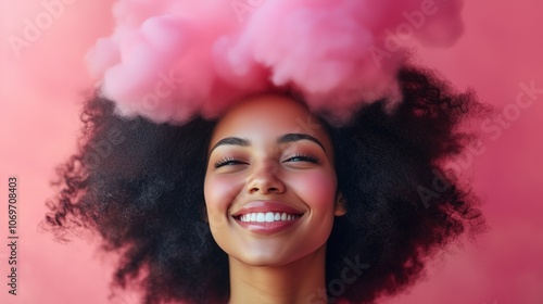 Smiling happy woman with amazing afro hair