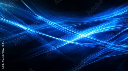 Dynamic blue light rays streak across a dark backdrop in an abstract pattern symbolizing motion and energy