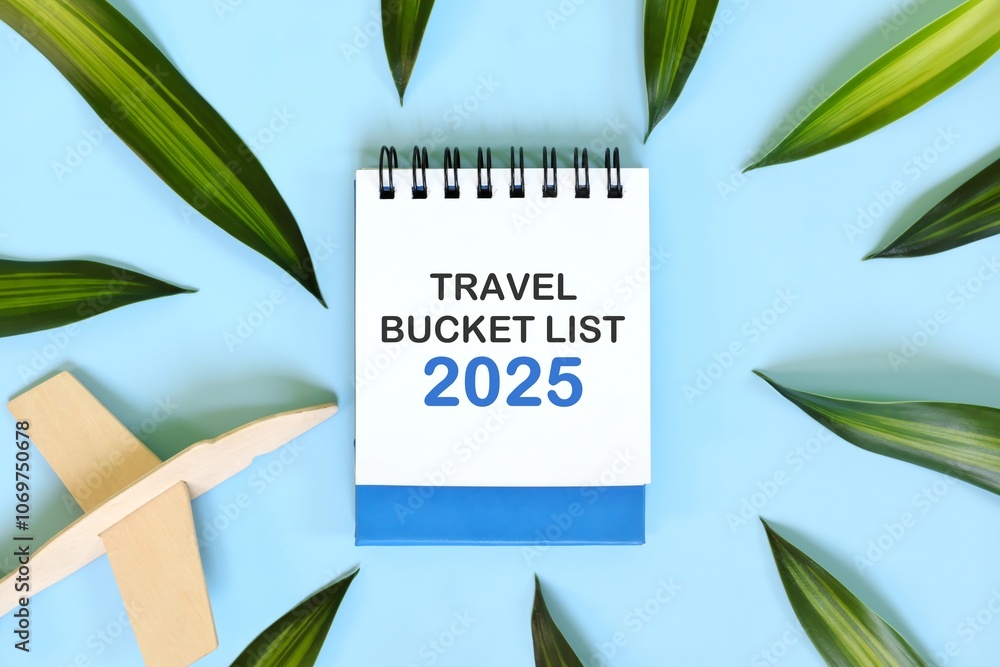 Year 2025 travel bucket list. Beautiful creative flat lay composition