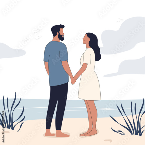 Young Indian couple standing in a beach and watching the sunset