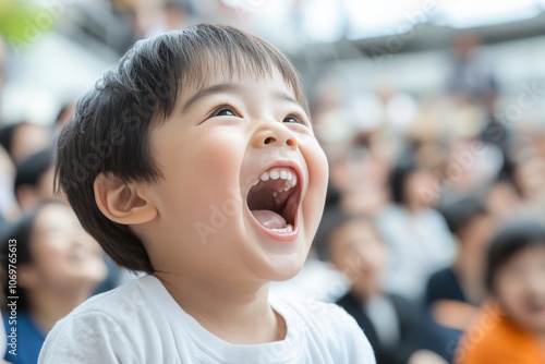 Joyful Child Watching Sumo Wrestling Match Enthusiastically