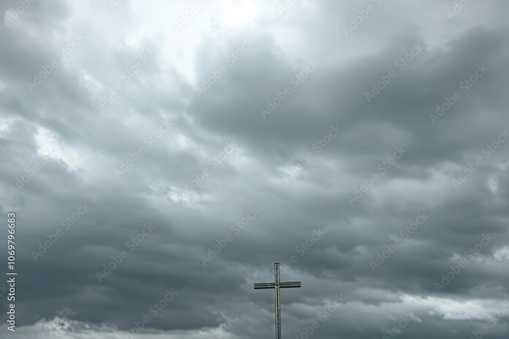 Christian cross symbolizes Jesuss resurrection on cloudy sky background. Christian cross symbolizes Jesuss resurrection on cloudy sky background.