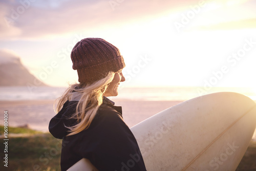 Photography Sunset, surfboard and woman by beach for travel with winter vacation, adventure or holiday