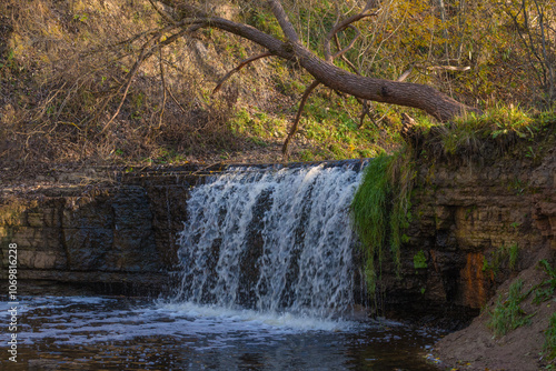 Sablinsky waterfall on the Sablinka river on a October day. Leningrad region, Russia photo