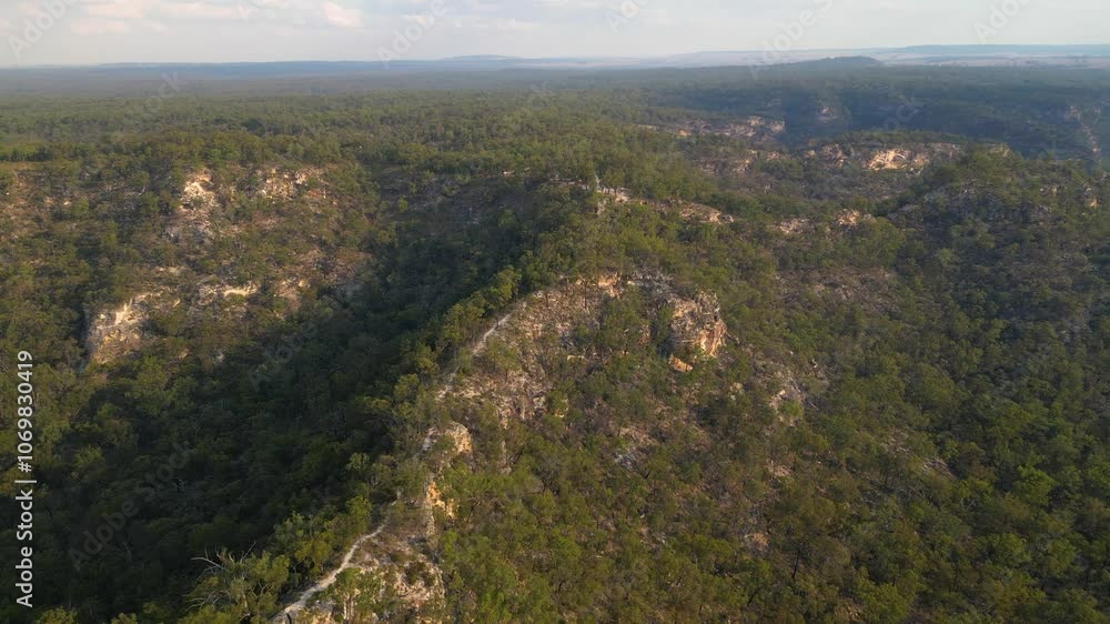 Left to right aerial views over Isla Gorge National Park walking trails at sunset, Queensland, Australia Left to right aerial views over Isla Gorge National Park walking trails at sunset, Queensland, Australia