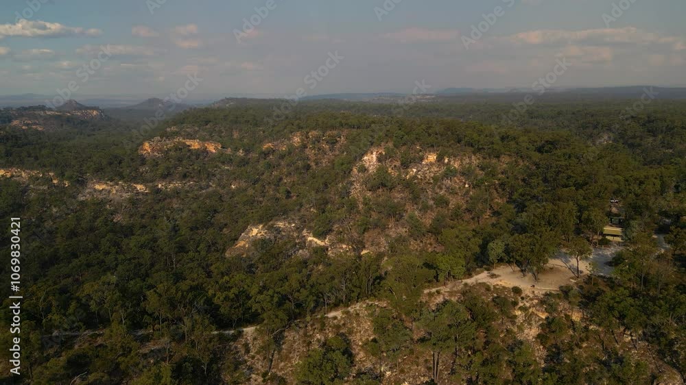 Vertical rising aerial views over Isla Gorge National Park walking trails and campground at sunset, Queensland, Australia Vertical rising aerial views over Isla Gorge National Park walking trails and campground at sunset, Queensland, Australia