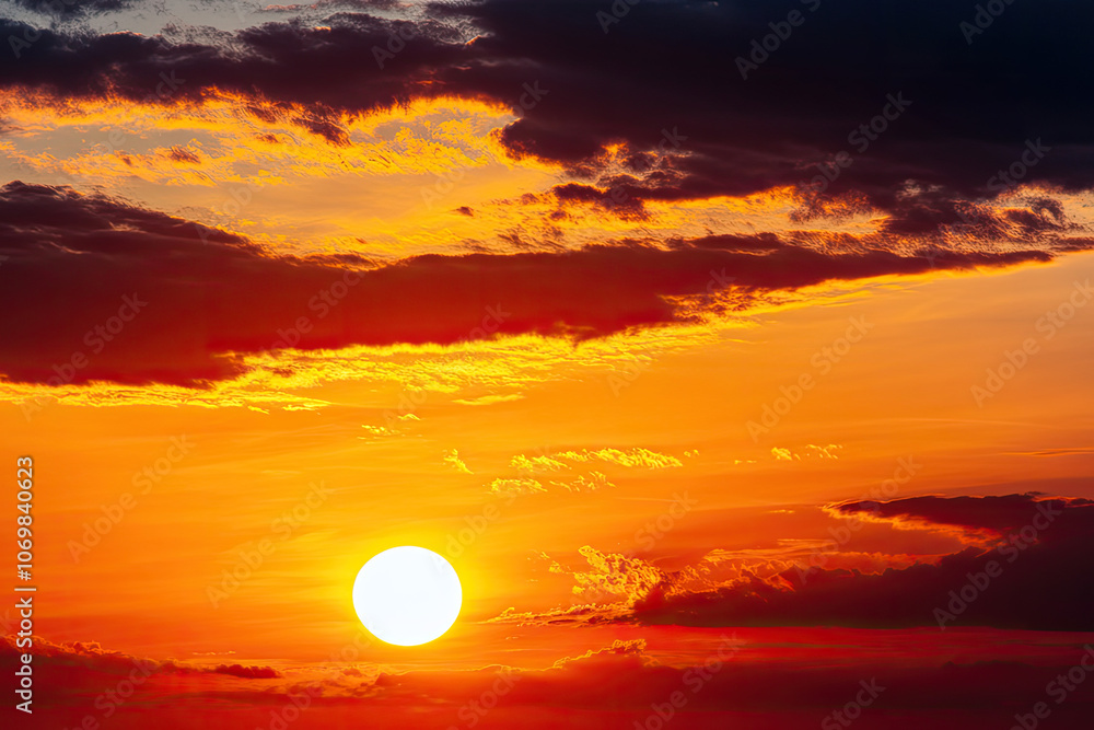 Vibrant sunset over clouds, dramatic sky with orange and purple hues. Vibrant sunset over clouds, dramatic sky with orange and purple hues.