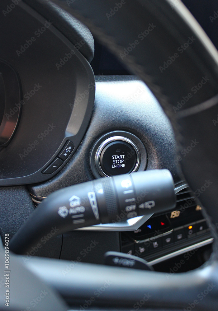 Function Buttons And Electronic Controls On Car Dashboard Under Steering Wheel
Function Buttons And Electronic Controls On Car Dashboard Under Steering Wheel