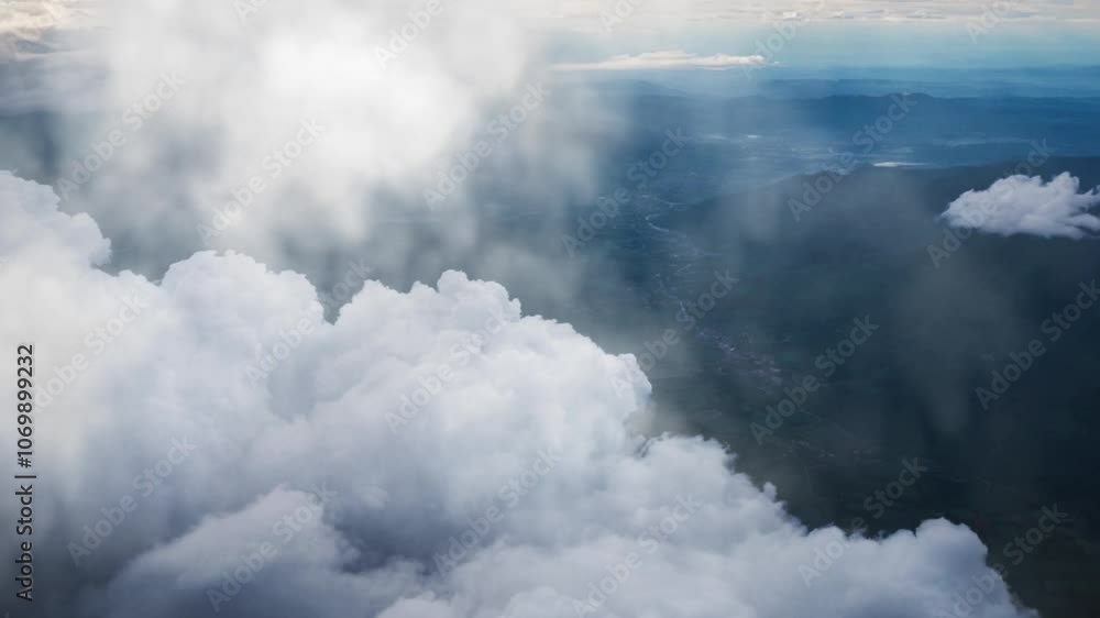 aerial view of white clouds above the mountains aerial view of white clouds above the mountains