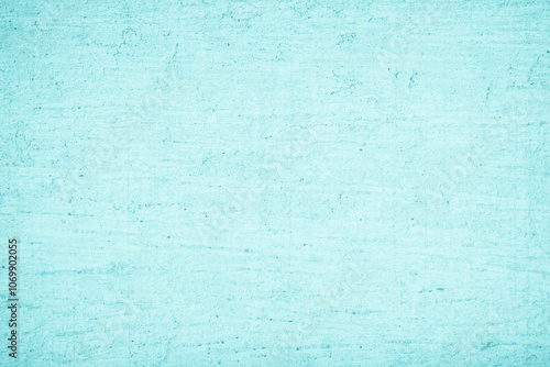 Grungy blue textured paper background with faded watercolor paint stains.