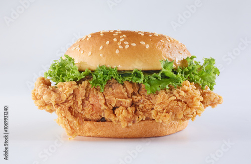 Zinger Burger, prepared by delicious and crunchy coated chicken flay with lettuce, garlic mayonnaise and fresh bun. 