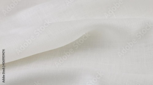Wallpaper Mural Soft folds of the white linen fabric rotates on the showcase. Top view of textile background. Theme design, fashion, tailoring of clothes. Torontodigital.ca