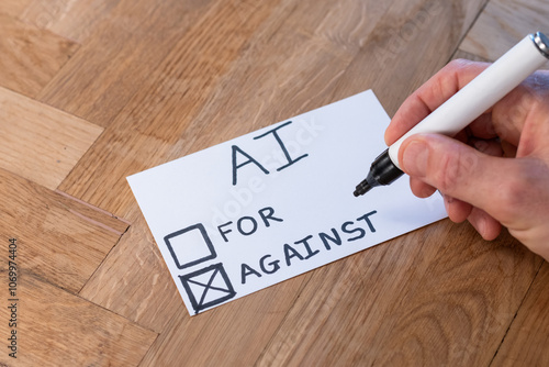 human hand with pen casts negative vote on popular trending topic AI Artificial Intelligence. Public opinion varies on computer automation and ethics. people resist modern technology 