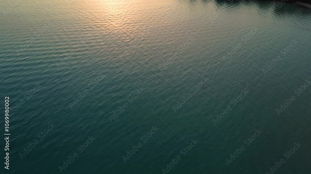 Cinematic drone aerial view beautiful evening sunset in sky over ocean Cinematic drone aerial view beautiful evening sunset in sky over ocean