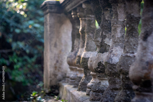 An old abandoned peeling balustrade in the park