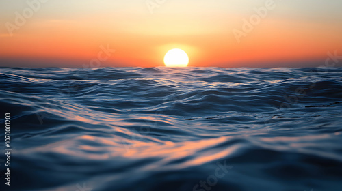 Close-Up View of Ocean Waves with a Sunset in the Background