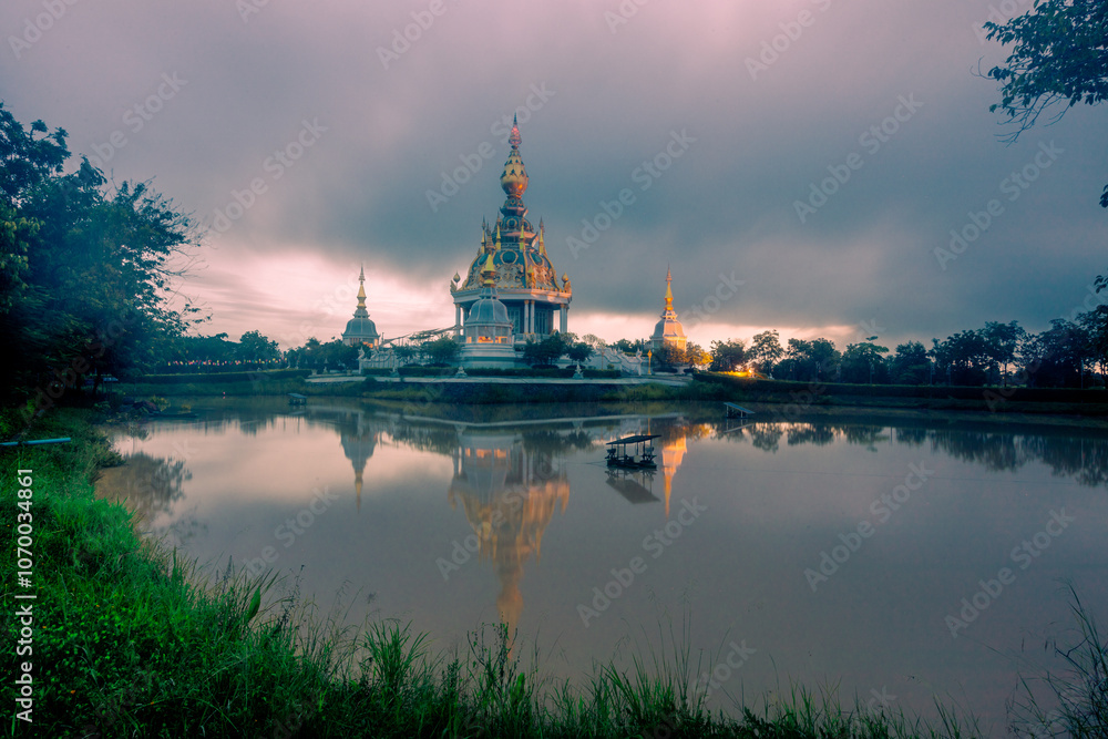 Fototapeta premium The background of an important tourist attraction in Khon Kaen Province (Wat Thung Setthi) is a large pagoda in the middle of a swamp, tourists always come to see the beauty in Thailand