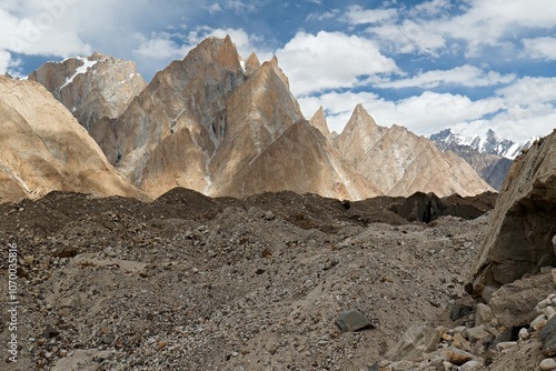 A view of the granite Trango Towers rocks and the Baltoro glacier while hiking to Khorbutse Camp. Karakoram Mountains. Gilgit-Baltistan region. Pakistan. Asia. photo