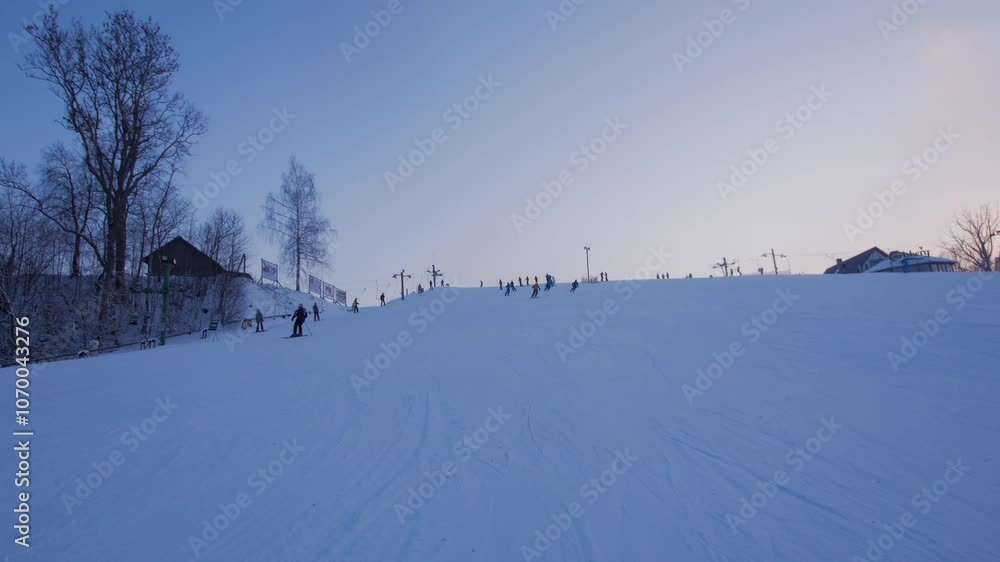 Skier Goes Down the Hill POV. Several Other Skiers Pass By. A Skier or Snowboarder May Overtake Another Skier or Snowboarder if there is Sufficient Space and Visibility. Skier Goes Down the Hill POV. Several Other Skiers Pass By. A Skier or Snowboarder May Overtake Another Skier or Snowboarder if there is Sufficient Space and Visibility.