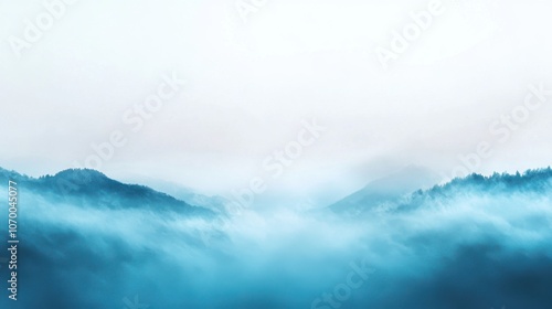 A serene landscape with misty blue mountains fading into the background, evoking tranquility and calmness.