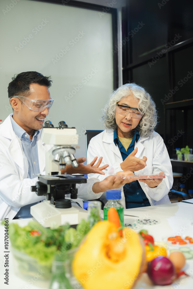 Microbiologist Working on Molecule Samples in Modern Food Science Laboratory. Microbiologist Working on Molecule Samples in Modern Food Science Laboratory.