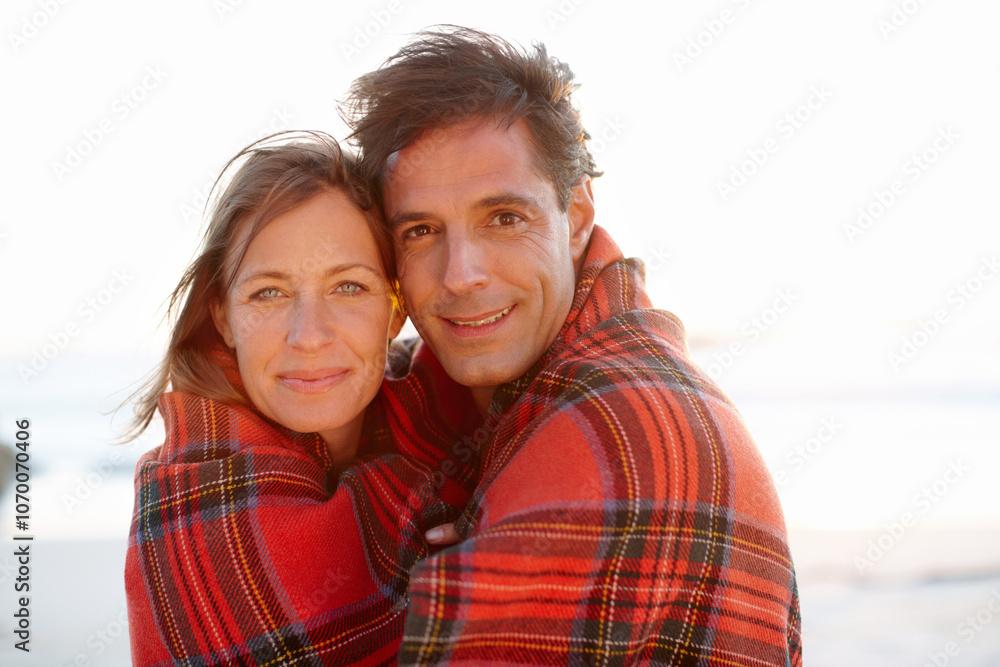 Hug, blanket or couple at ocean for portrait or love on vacation, anniversary or honeymoon holiday. Care, cold or people with smile on date at sea together for travel, bonding or beach trip in Spain Hug, blanket or couple at ocean for portrait or love on vacation, anniversary or honeymoon holiday. Care, cold or people with smile on date at sea together for travel, bonding or beach trip in Spain