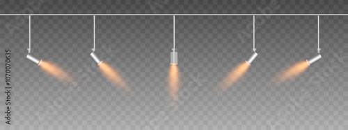 Row of adjustable spotlights emitting a soft gold glow. Angled lights create a focused beam effect, adding ambiance to a dark background. Modern interior designs, exhibitions, and stage lighting