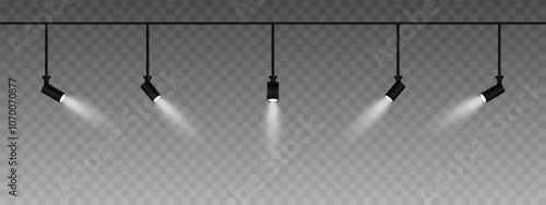 Row of adjustable spotlights emitting a soft white glow. Angled lights create a focused beam effect, adding ambiance to a dark background. Modern interior designs, exhibitions, and stage lighting