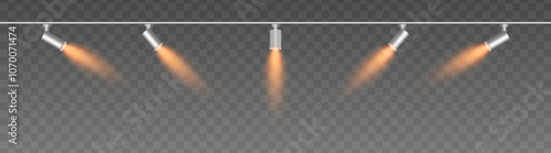 Row of adjustable spotlights with warm orange glow, casting angled beams. Modern lighting setup suitable for stage, exhibition, or interior decor, adding ambiance against a dark background