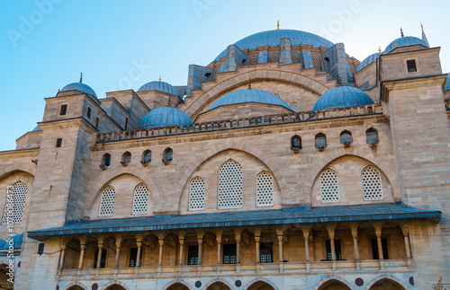 Suleymaniye Mosque against the background of a blue sky with clouds, the architecture of the Islamic religion, Istanbul, Turkey photo