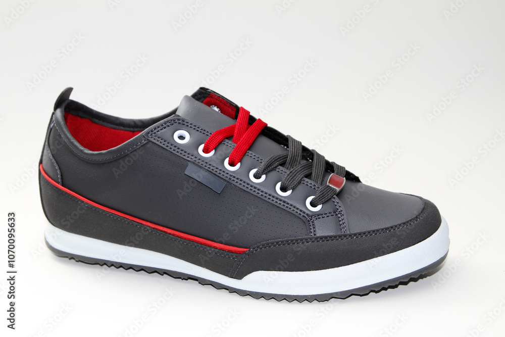 Men's sneakers. White background. Side view Unbranded shoes.
Men's sneakers. White background. Side view Unbranded shoes.