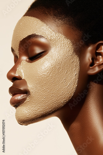 Obraz na płótnie A soothing close-up of a woman with a clay mask, eyes closed, embracing skincare and wellness. w salonie