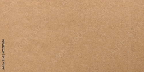 Brown cardboard sheet abstract background, texture of recycle paper box in old vintage pattern for design art work. Brown paper texture. Kraft paper for wraping