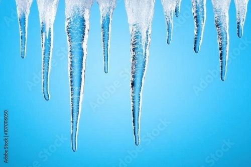 Sparkling Icicles Hanging from a Roof in Winter Sunlight