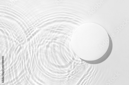 White round podium on the water surface background. Flat lay, copy space